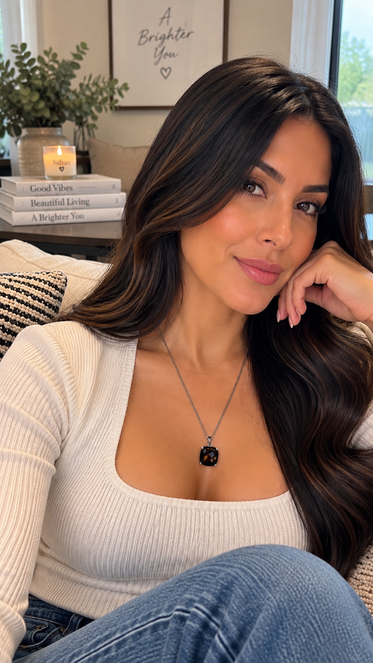 Add a touch of earthy elegance to your style with this beautiful Smoky Quartz Pendant Necklace. Featuring a deep smoky-brown gemstone in a sleek oval setting, this piece has a sophisticated, minimalist look that pairs beautifully with both casual and professional outfits.